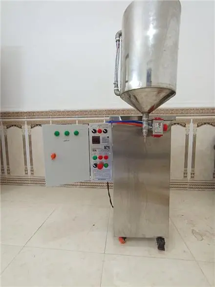 دستگاه پرکن مایعات سیلندر پیستونی